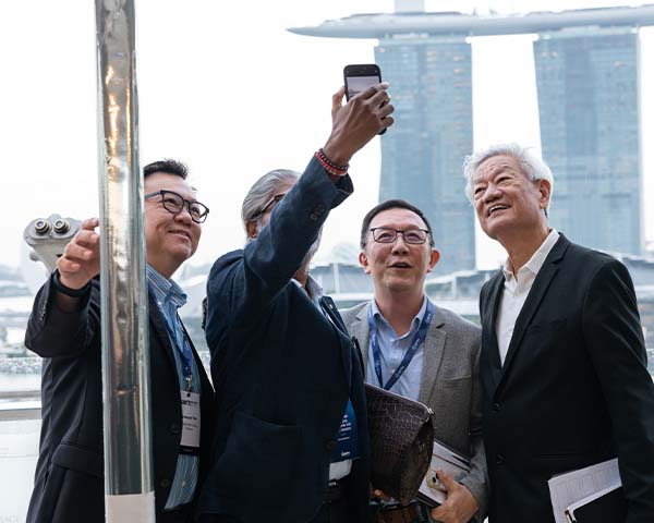 Attendees taking a selfie at the Ignite Investment Summit Singapore 2026